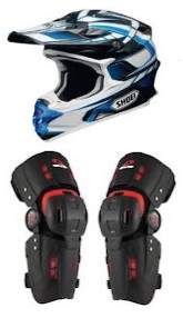 dirtbike helmet and knee braces ready