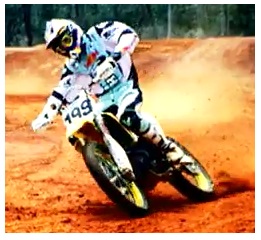 picture of a dirtbike rider on a corner