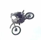 Freestyle Motocross rider flips and twists